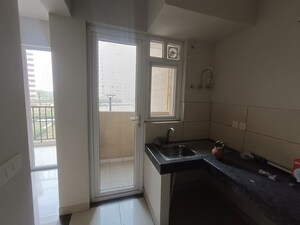 Kitchen in 2 BHK Apartment at Tata Eureka Park, Sector 150 – for Rent