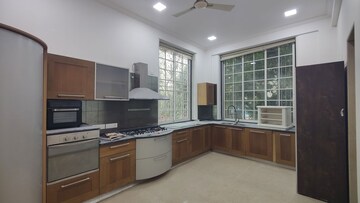 Kitchen in 4 BHK Villa at T Bhimjyani Neelkanth Woods, Manpada – for Sale