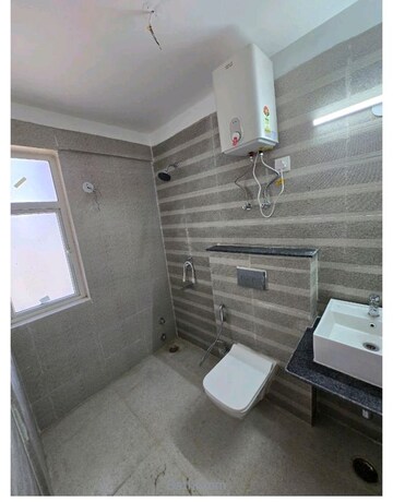 Bathroom in 2 BHK Apartment at Signature Global Orchard Avenue, Sector 93 – for Sale