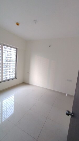 Room in 2 BHK Apartment at Kolte Patil R10, Hinjewadi – for Sale