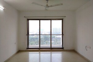 Room in 2 BHK Apartment at Kalpataru Aura, Ghatkopar West – for Sale