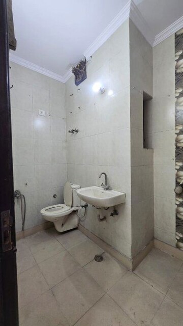 Bathroom in 2 BHK Builder Floor at Apex Anuradha Apartments, Paschim Vihar – for Rent