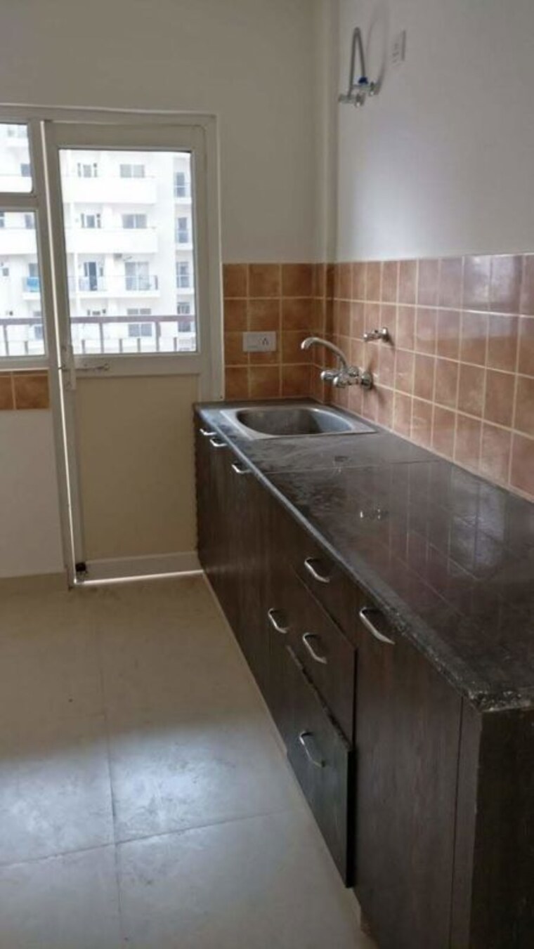 Kitchen, aims-golf-avenue-ii 2 Bedroom 930 Sq.Ft. Apartment In Sector 75 Noida 9838507