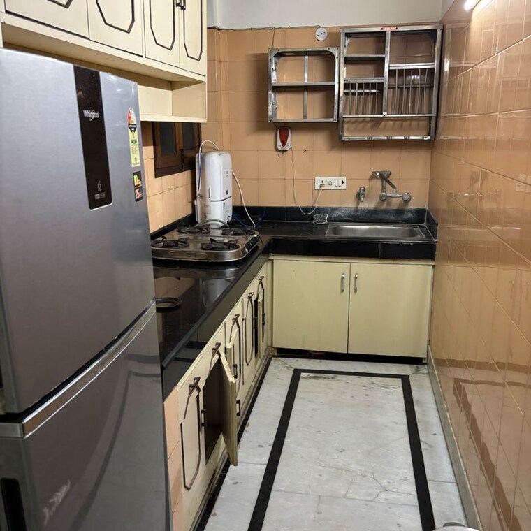 Kitchen, amar colony 2 Bedroom 100 Sq.Yd. Builder Floor In Amar Colony Delhi 9838839