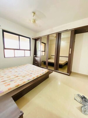 Bedroom in 2 BHK Apartment at Dorabjee Paradise Building A&B Condominium, Mohammadwadi – for Rent