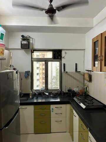 Kitchen in 1 BHK Apartment at Puranik Rumah Bali, Ghodbunder Road – for Rent
