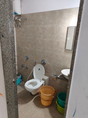 Bathroom in 2 BHK Apartment at Yashraj Park CHS, Kasarvadavali – for Rent