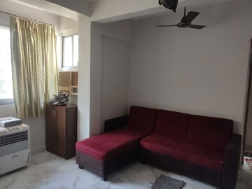 Living Room in 1 BHK Apartment at Juhu – for Rent