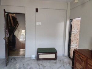 Living Room in 1 BHK Apartment at Juhu – for Rent