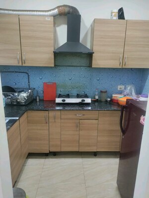 Kitchen in 2 BHK Apartment at Gaur 14th Avenue High Street, Panchsheel Green – for Rent