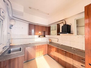 Kitchen in 3 BHK Apartment at Dasnac The Jewel, Sector 75 – for Sale