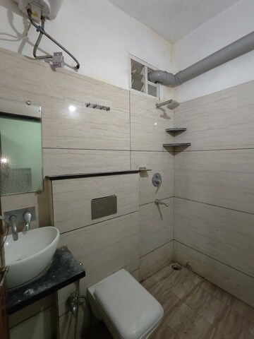 Bathroom in 1 BHK Apartment at Satguru Heights, Gulmohar Colony – for Rent