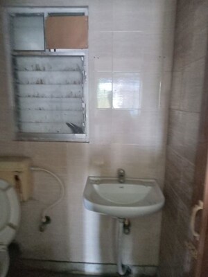 Bathroom in 3 BHK Apartment at Dunlop – for Sale