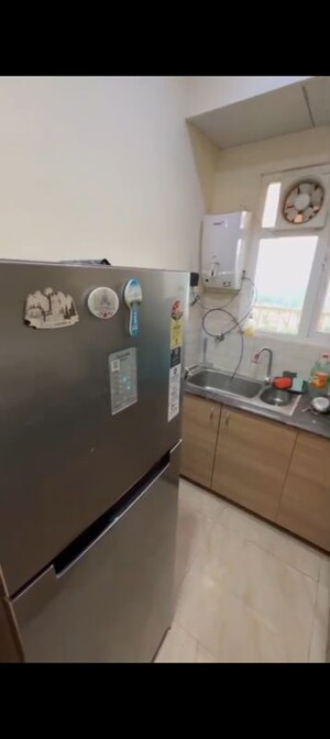 Kitchen in 2 BHK Apartment at Gaur City 7th Avenue, Sector 4 Greater Noida – for Rent