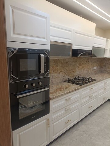 Kitchen in 3 BHK Builder Floor at Ansal API Esencia, Sector 67 – for Rent