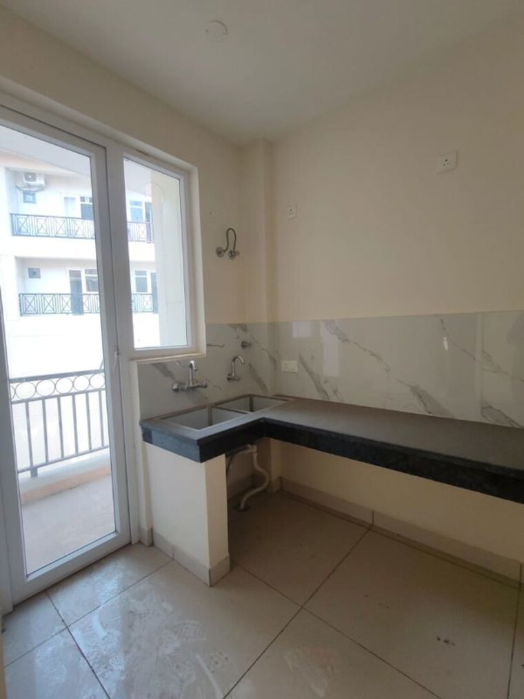 Kitchen, sbp-city-of-dreams-zirakpur 2 Bedroom 623 Sq.Ft. Apartment In High Ground Zirakpur 9840136