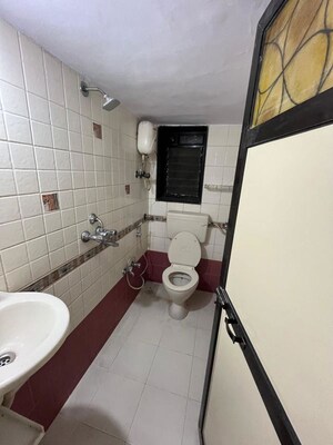 Bathroom in 1 BHK Apartment at Versova Sea Green Apartment, Andheri West – for Rent