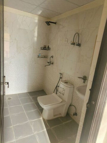 Bathroom in 3 BHK Apartment at Gardenia Golf City, Sector 75 – for Rent