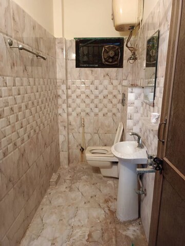 Bathroom in 3 BHK Apartment at Bankey Bihari Kunj, Shalimar Garden – for Rent