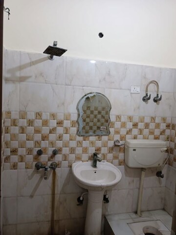 Bathroom in 3 BHK Apartment at Bankey Bihari Kunj, Shalimar Garden – for Rent