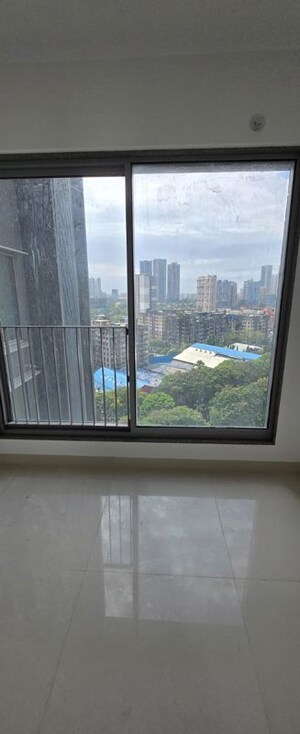 Room in 2 BHK Apartment at Sunteck City Avenue 4, Goregaon West – for Sale