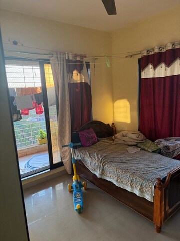 Bedroom in 2 BHK Apartment at Mahalaxmi CHS Kharghar Sector 15, Kharghar Sector 15 – for Rent