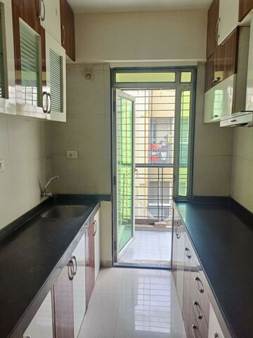 Kitchen in 2.5 BHK Apartment at Dheeraj Jade Residences, Wagholi – for Rent