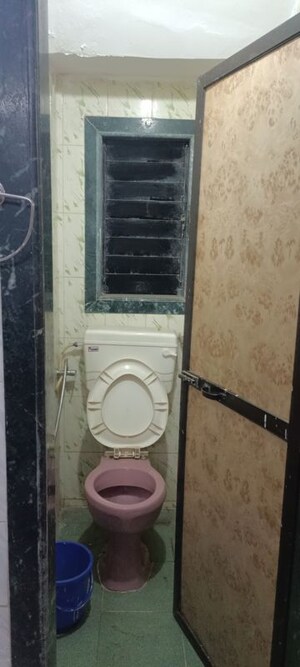 Bathroom in 1 BHK Builder Floor at Shantinagar CHS, Mira Road – for Rent