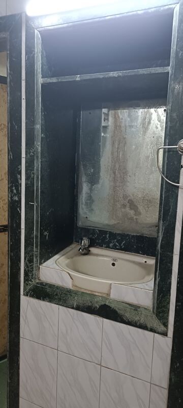 Bathroom in 1 BHK Builder Floor at Shantinagar CHS, Mira Road – for Rent