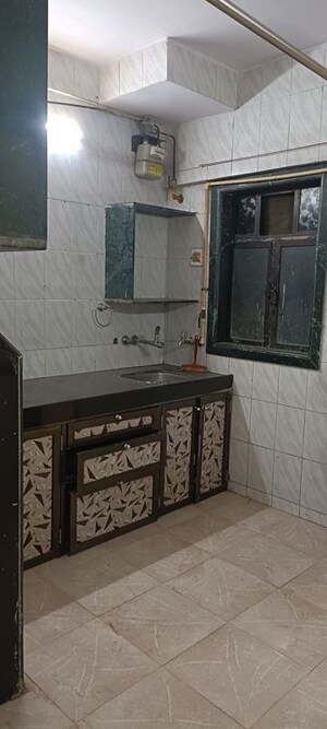 Kitchen in 1 BHK Builder Floor at Shantinagar CHS, Mira Road – for Rent