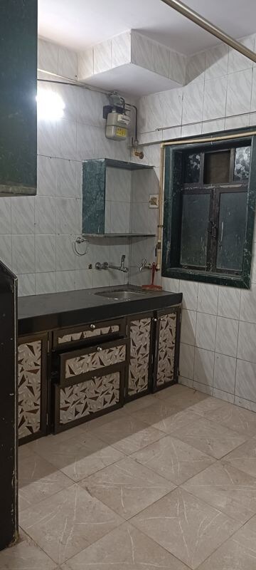 Kitchen in 1 BHK Builder Floor at Shantinagar CHS, Mira Road – for Rent