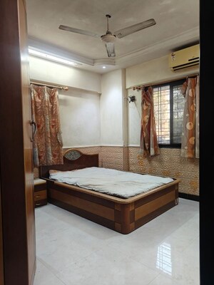 Bedroom in 3 BHK Apartment at Kalpataru Classic, Malad West – for Rent