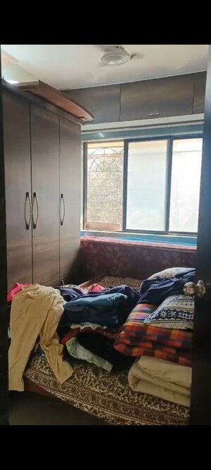 Bedroom in 2 BHK Apartment at Yashraj Park CHS, Kasarvadavali – for Rent