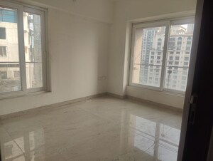 Room in 2.5 BHK Apartment at ND Palai Towers, Goregaon West – for Sale