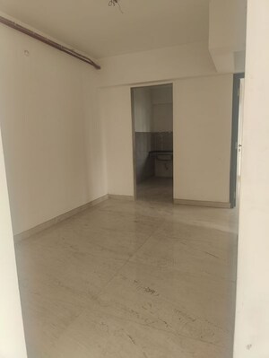 Room in 2.5 BHK Apartment at ND Palai Towers, Goregaon West – for Sale