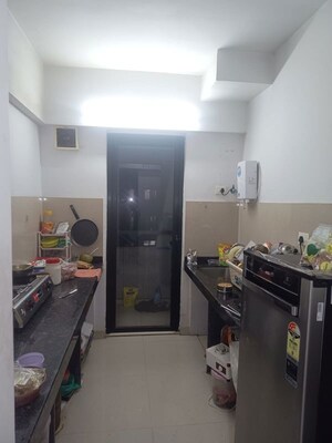 Kitchen in 1 BHK Apartment at Lodha Palava Eviva K To T Urbano A C F and I To T, Dombivli East – for Rent