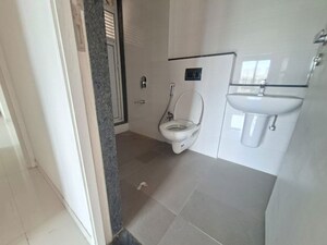 Bathroom in 2 BHK Apartment at Rustomjee Azziano Wing D, Thane West – for Rent
