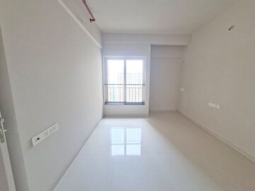 Room in 2 BHK Apartment at Rustomjee Azziano Wing D, Thane West – for Sale