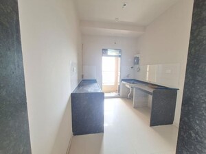 Living Room in 2 BHK Apartment at Rustomjee Azziano Wing D, Thane West – for Sale