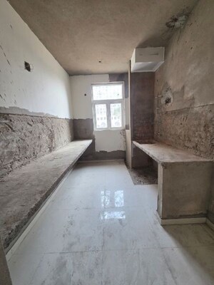 Kitchen in 2.5 BHK Apartment at Omaxe Hazratganj, Gomti Nagar – for Sale