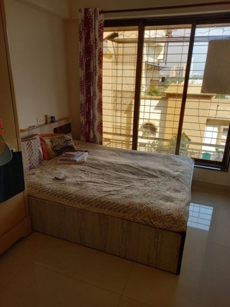 Bedroom, rna-ng-vibrancy 1 Bedroom 450 Sq.Ft. Apartment In Mira Road Thane 9841450