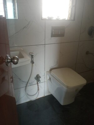 Bathroom in 1 BHK Apartment at RNA NG Vibrancy, Mira Road – for Rent