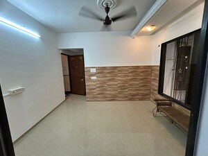 Living Room in 1 BHK Apartment at Juhu – for Rent