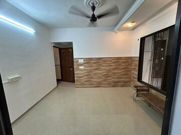Living Room in 1 BHK Apartment at Juhu – for Rent