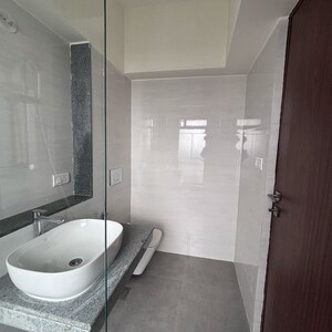 Bathroom in 2 BHK Apartment at Dynamix Divum, Riddhi Gardens – for Rent