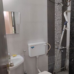 Bathroom in 1 BHK Apartment at Kanifnath Archana Prestige, Handewadi – for Rent