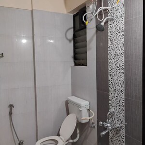 Bathroom in 1 BHK Apartment at Kanifnath Archana Prestige, Handewadi – for Rent