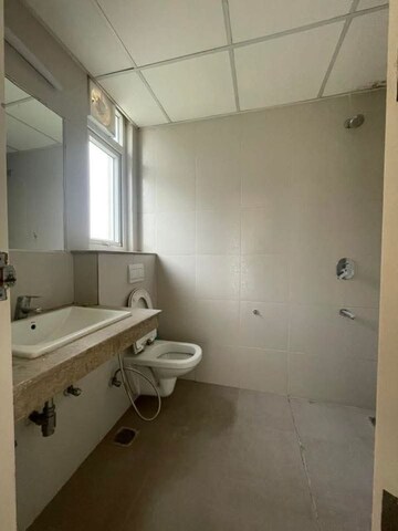 Bathroom in 4 BHK Apartment at Conscient Heritage Max, Sector 102 – for Rent