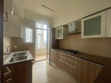 Kitchen in 3 BHK Apartment at Puri Emerald Bay, Sector 104 – for Rent