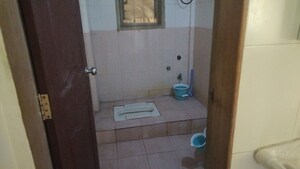 Bathroom in 2 BHK Apartment at Yash Sankul, Pimple Saudagar – for Rent